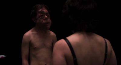 Still from Under The Skin (2013) that has been tagged with: a67a59 & night & medium wide & over-the-shoulder