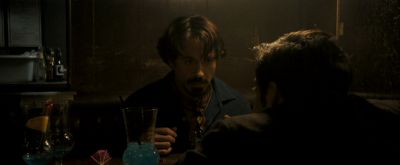 Still from Zodiac (2007) that has been tagged with: night & medium shot & restaurant & over-the-shoulder & interior & bar